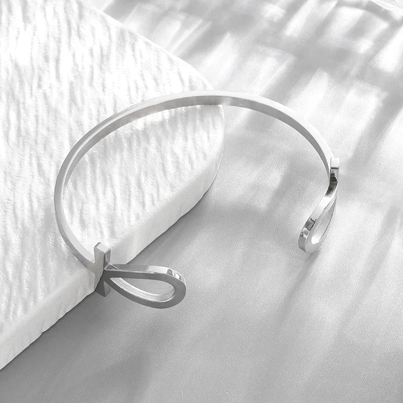 Adjustable Metal Cuff Bracelet with Feather and Tang Grass Motif – Unisex Design - All you need