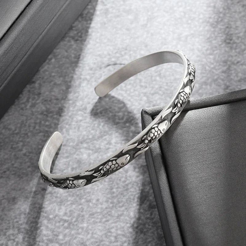 Adjustable Metal Cuff Bracelet with Feather and Tang Grass Motif – Unisex Design - All you need