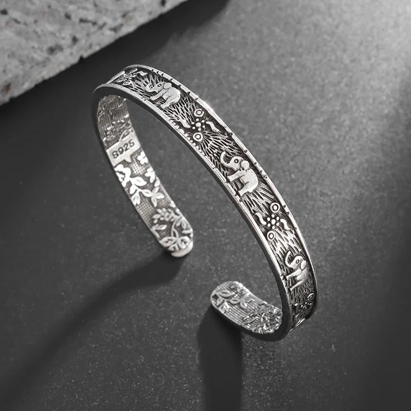 Adjustable Metal Cuff Bracelet with Feather and Tang Grass Motif – Unisex Design - All you need